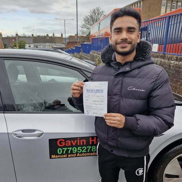 A learner celebrating passing their driving test with UDrive2Day in Bury St Edmunds