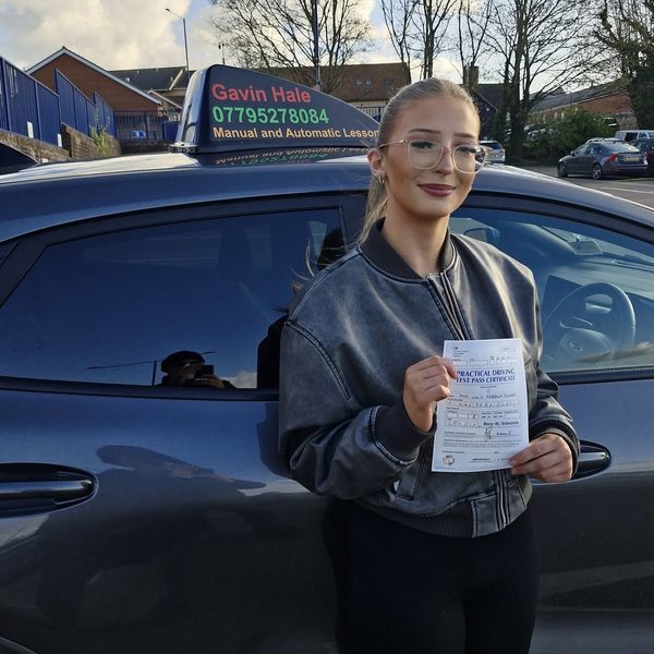 A learner celebrating passing their driving test with UDrive2Day in Bury St Edmunds