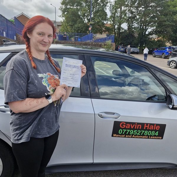 A learner celebrating passing their driving test with UDrive2Day in Bury St Edmunds