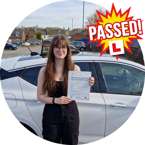A learner celebrating passing their driving test with UDrive2Day
