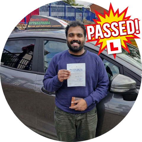 A learner celebrating passing their driving test with UDrive2Day