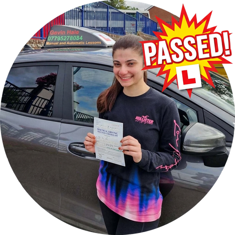 A learner celebrating passing their driving test with UDrive2Day