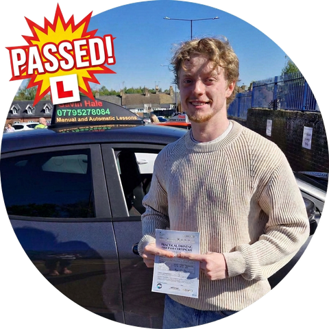 A learner celebrating passing their driving test with UDrive2Day