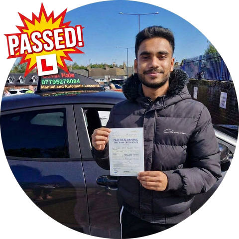 A learner celebrating passing their driving test with UDrive2Day